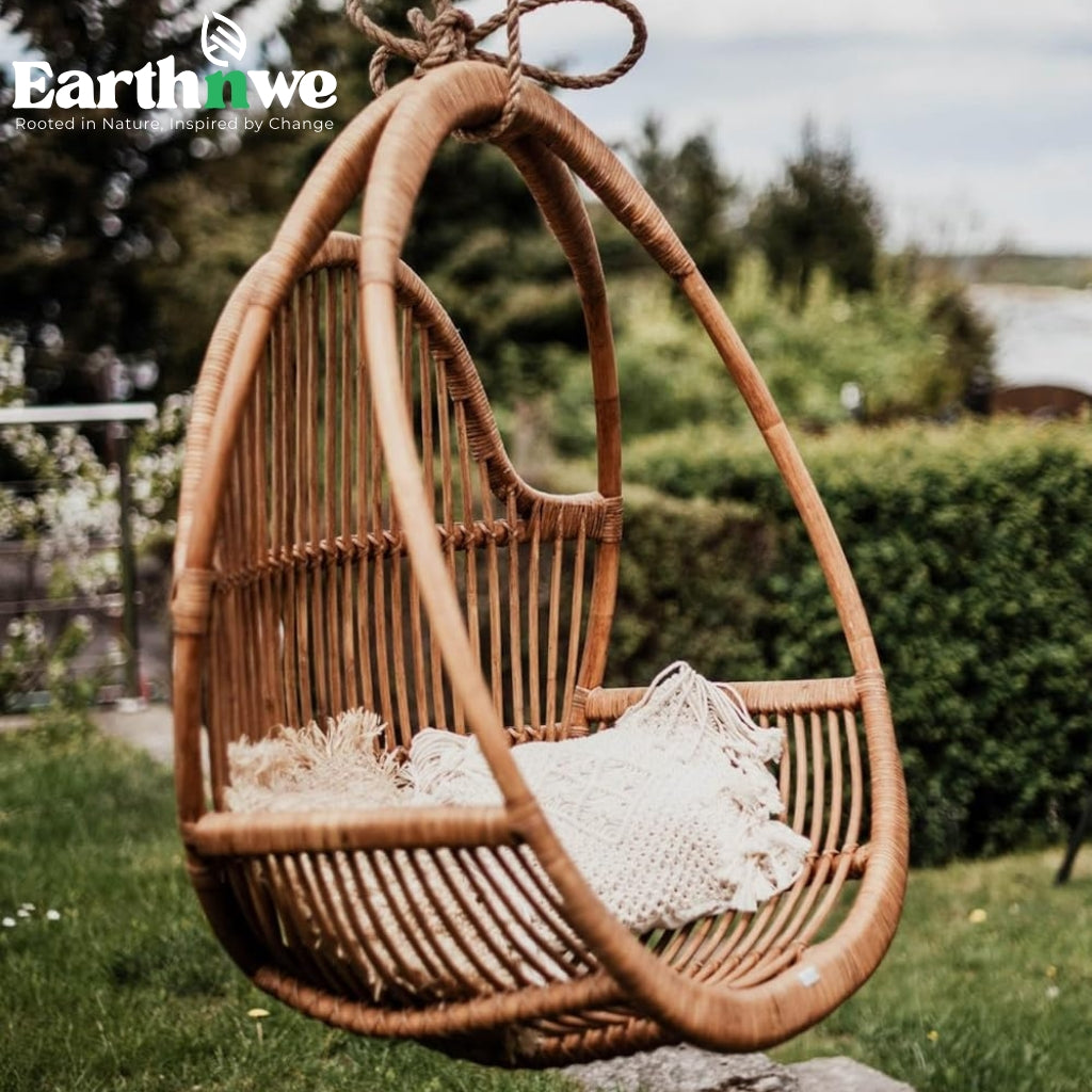 Handcrafted rattan swing chair for indoor outdoor use
