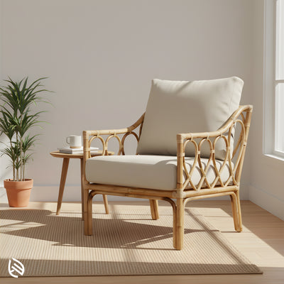 Natural rattan cafe chair with cream cushions by sunny window