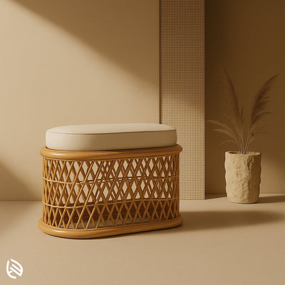 Oval rattan storage stool with crisscross weave and beige cushion for versatile indoor seating