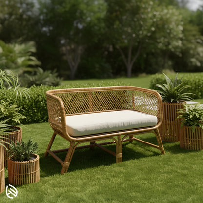 Rattan 2-seater sofa styled in garden with planters, covered outdoor ready