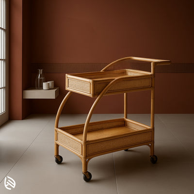 Two-tier natural rattan bar cart with curved handles and wheels, ideal for serving drinks or snacks at home