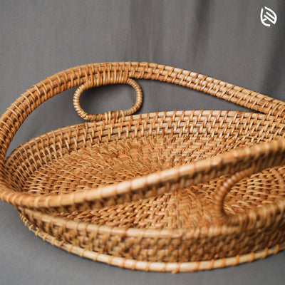 Detailed close-up of Harvest Hold tray handle and intricate woven cane texture – artisan craftsmanship