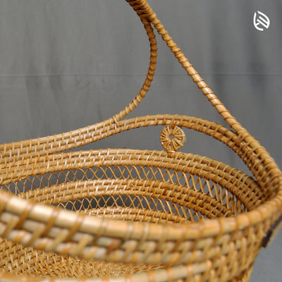 Side angle of reinforced curved handle on EarthNWe Tidy Trove basket