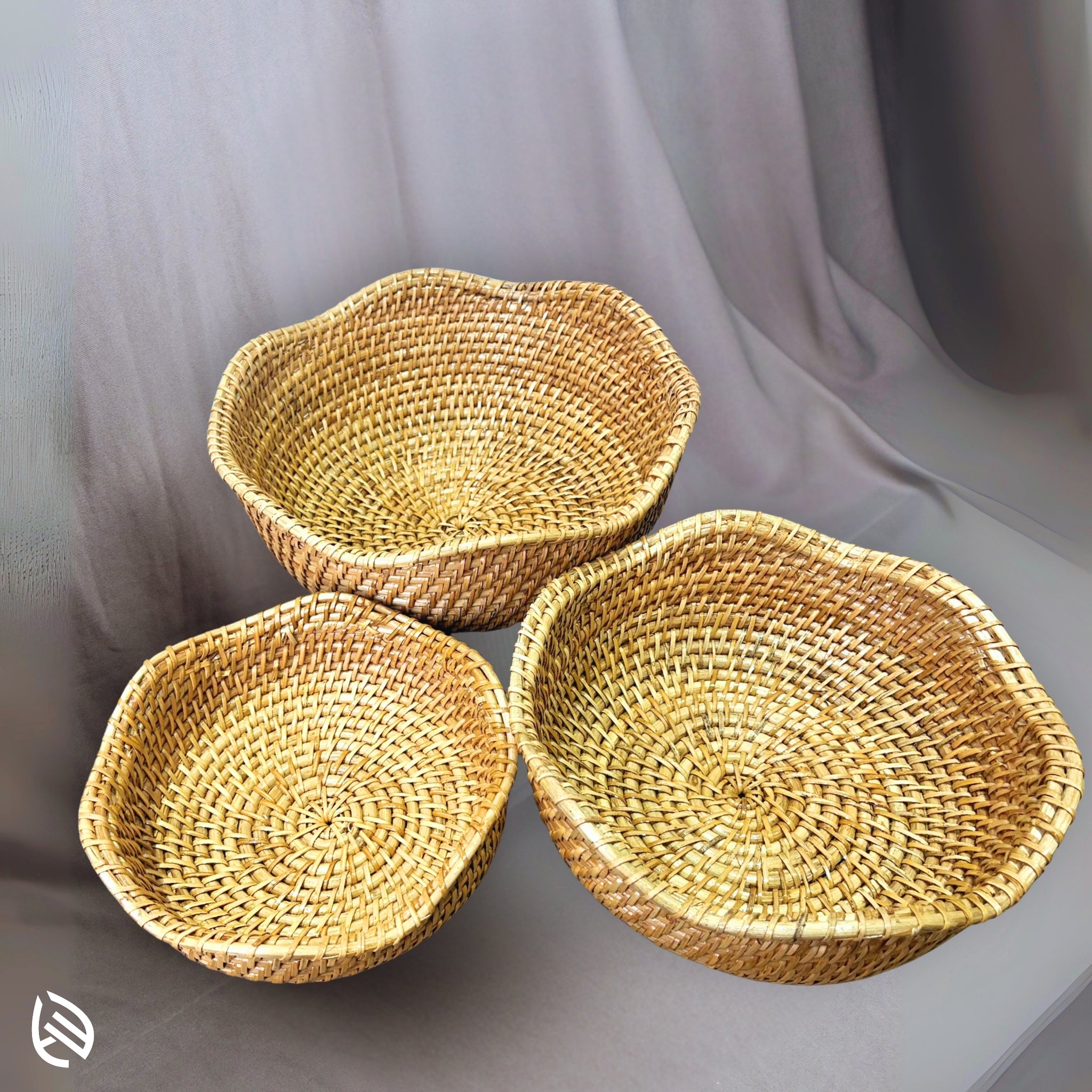 Trio of handcrafted natural rattan baskets by EarthNWe