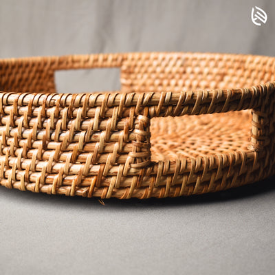 Close-up of cane weaving and integrated cut-out handle detail on Whisper Weave tray