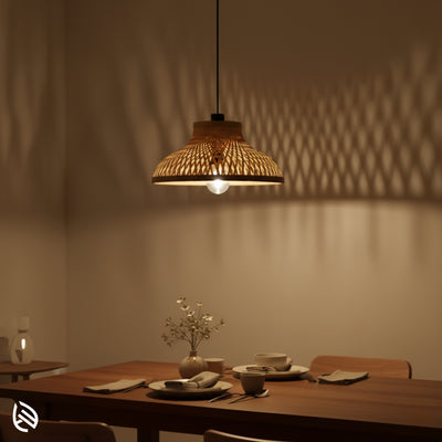EcoLoom bamboo dining pendant over table, warm ambient glow with diamond shadow patterns.