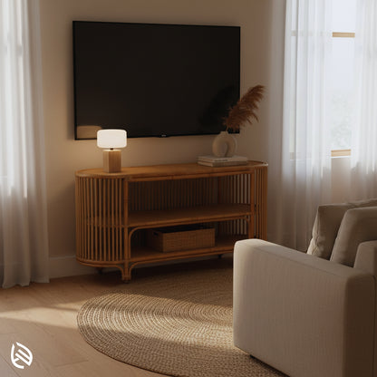 Rattan TV stand under wall-mounted TV - Entertainment Center Rattan TV Console with open storage shelves in cozy neutral room.