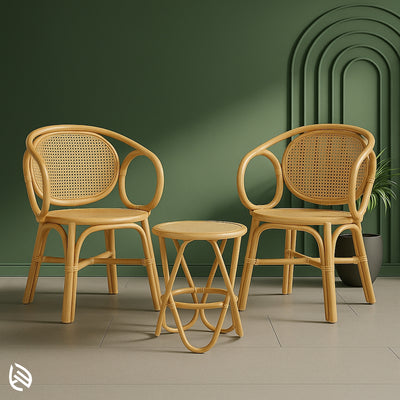 Pair of handcrafted rattan lounge chairs with matching round side table for patios
