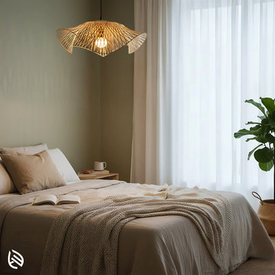 Radiance bamboo pendant lighting serene bedroom; cosy ambient glow through wave-edge shade.