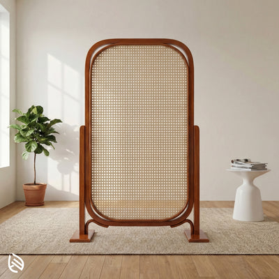Wooden room divider with wicker design in a modern interior setting