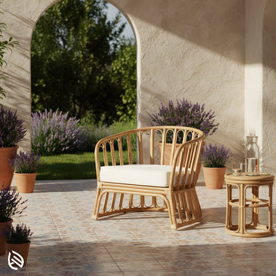 Curved rattan chair styled on covered patio with planters