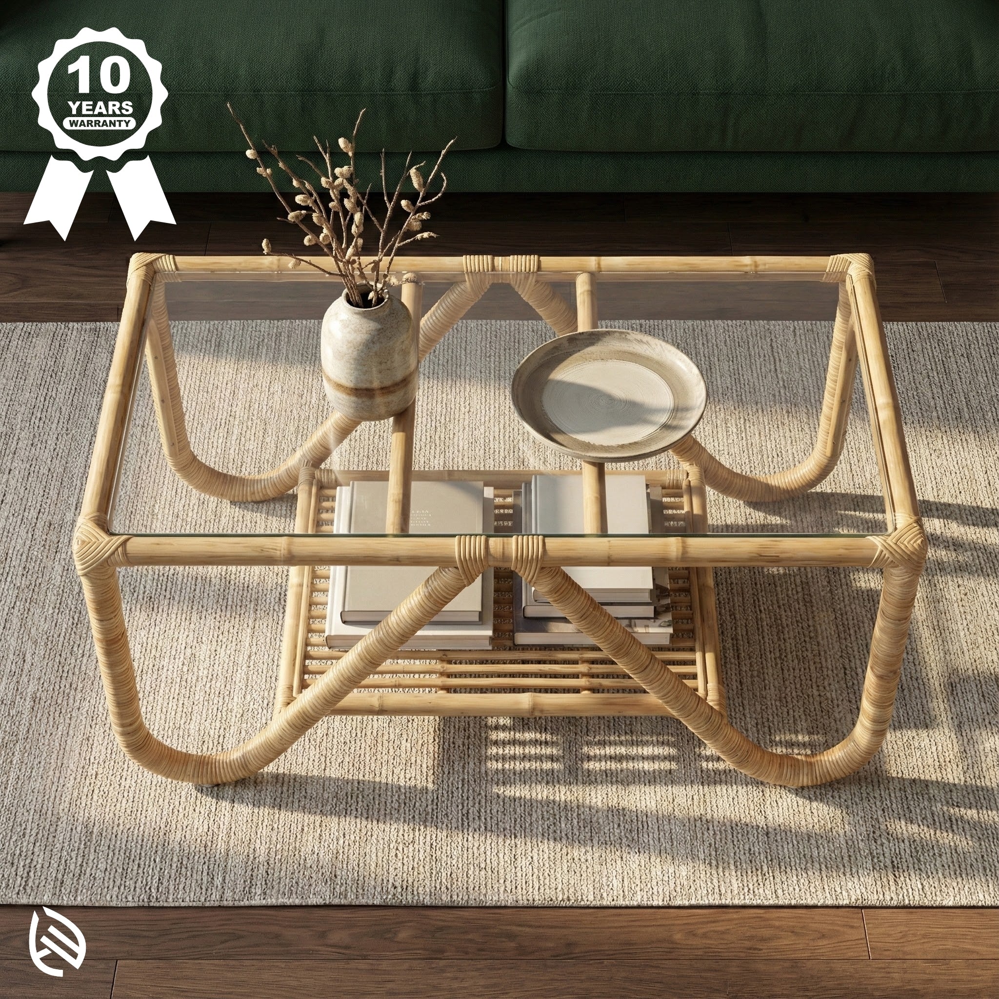 Rattan coffee table with glass top in a living room setting, featuring a 10-year warranty badge.
