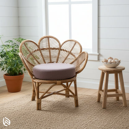 Natural rattan petal-back bistro chair with round cushion by window